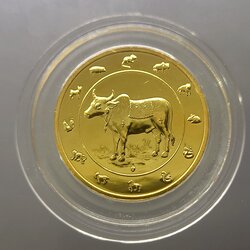 เหรียญนักษัตร ทองแดงชุบกาหลั่ยทอง ปีฉลู พ.ศ. 2552 กรมธนารักษ์สร้าง ไม่ผ่านใช้