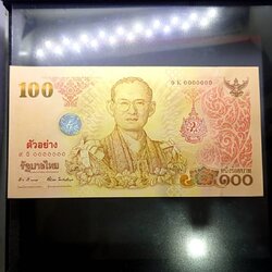 ธนบัตรตัวอย่าง ธนบัตรที่ระลึก 100 บาท พระบาทสมเด็จพระเจ้าอยู่หัว รัชกาลที่ 9 เฉลิมพระชนมพรรษาครบ 7 รอบ พ.ศ.2554