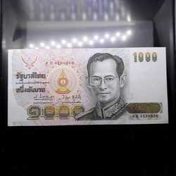 ธนบัตร 1000 บาท (ลายน้ำราชินี) ที่ระลึกสมเด็จพระนางเจ้าพระบรมราชินีนาถ เฉลิมพระชนมพรรษาครบ 5 รอบ รัชกาลที่9 ปี2535 ไม่ผ่านใช้