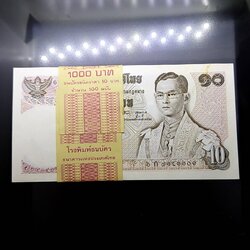 ธนบัตรยกแหนบ 100 ใบ เรียงเลข ธนบัตร 10 บาท แบบ 11 ไม่ผ่านใช้